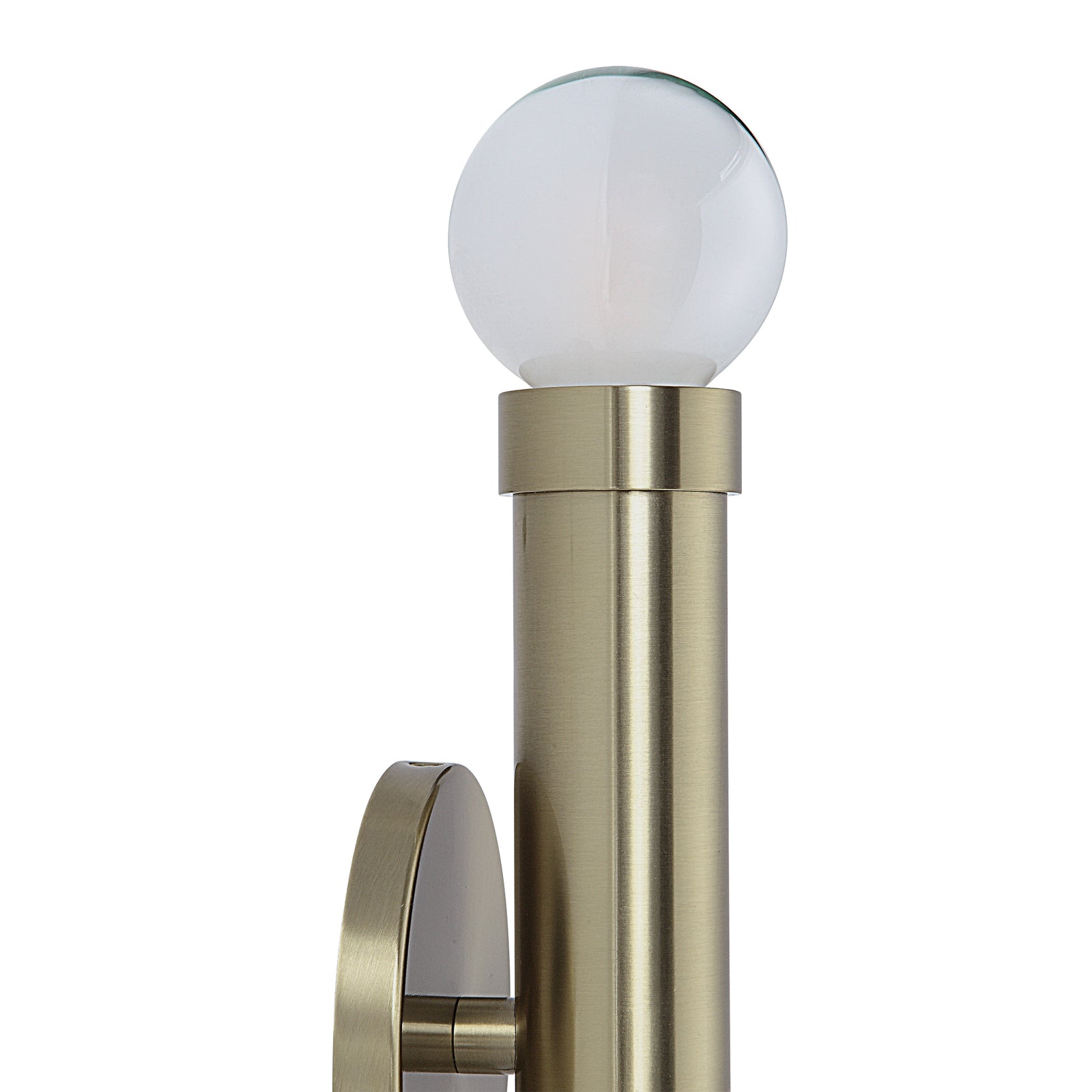 Dasia Wall Sconce in brushed brass with two globe bulbs, mounted vertically.