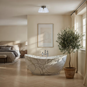 Liliane Flush Mount light installed in a bathroom setting above a marble tub.