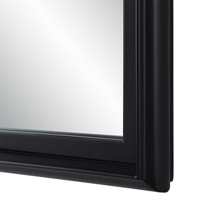 Close-up of Lausanne Wall Mirror's black frame, highlighting its smooth finish.