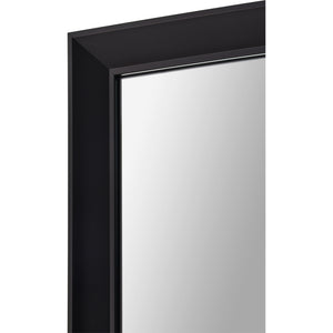 Close-up of Delacorte Wall Mirror's black frame highlighting its clean edges.