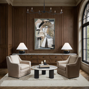 Pascal canvas art featured in a sophisticated setting with beige chairs and wooden accents.