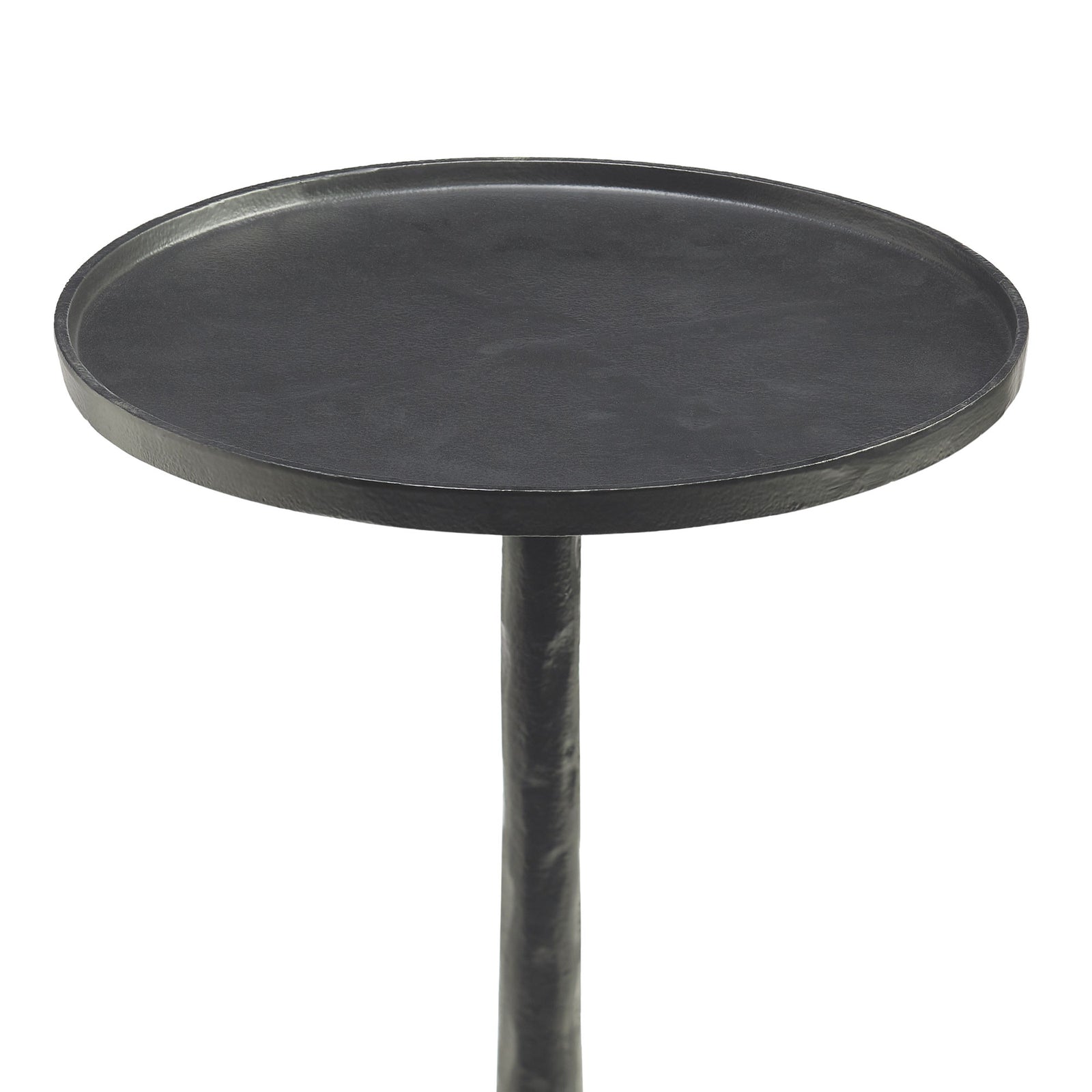 Konsta Table in black with a round top and three curved legs
