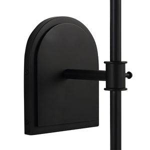 Close-up of Mililani wall sconce's black metal backplate and arm.