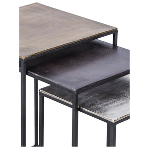 Threefold Indoor Aluminum Table featuring three tabletops in antique brass, dark brown, and silver, with a black frame.