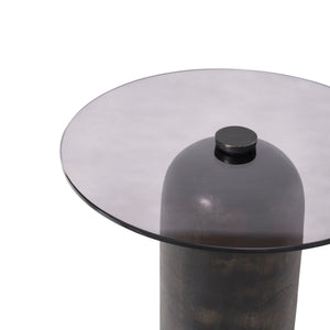 Top view of the Arta accent table, highlighting the round smoky glass top and central knob.