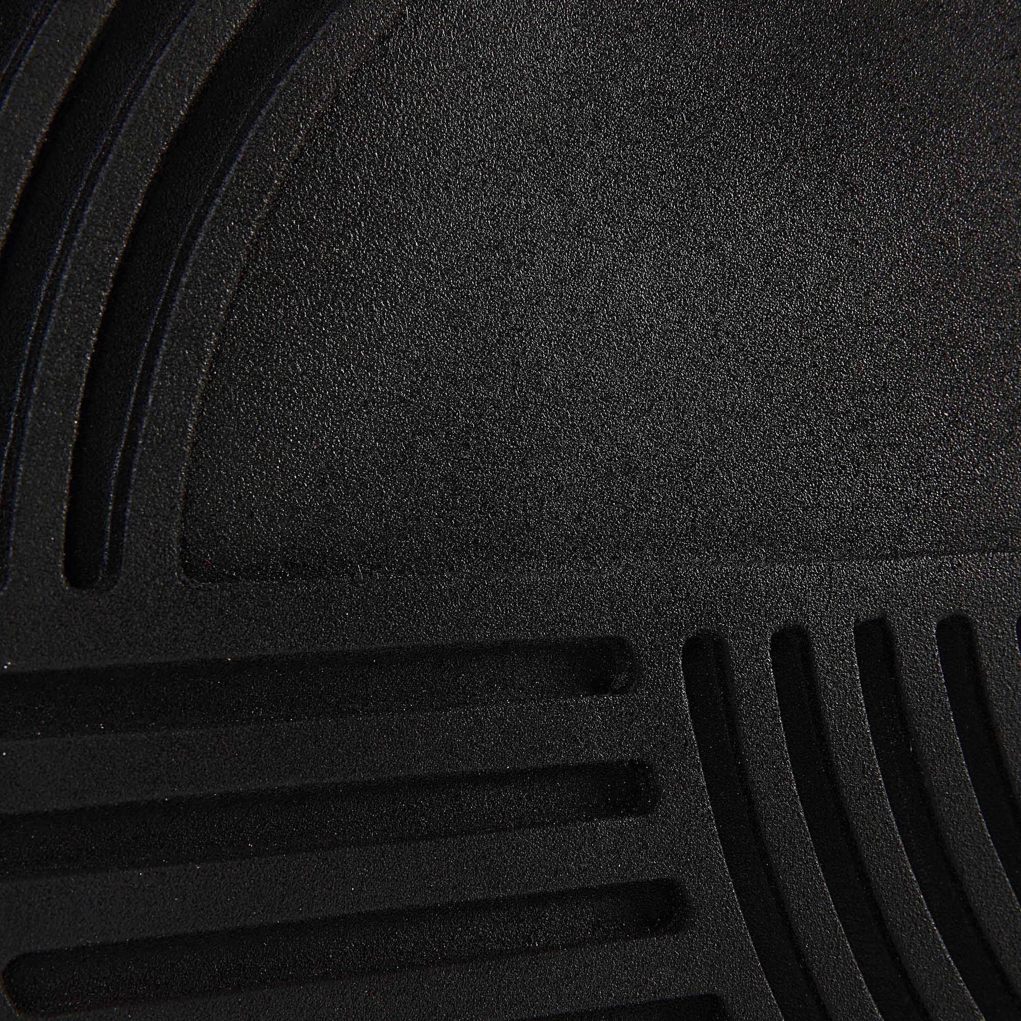 Sofia Wall Art featuring a textured black surface with curved lines and grooves.