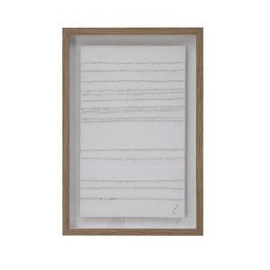 Framed Trax wall art with white textured canvas and a light wood frame.