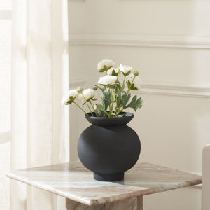 Cadiz vase by Renwil, close-up of the black ceramic vase's rim and textured surface.