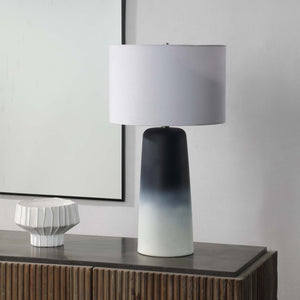 Monte Table Lamp on a console table, featuring a black and white gradient base and white shade.