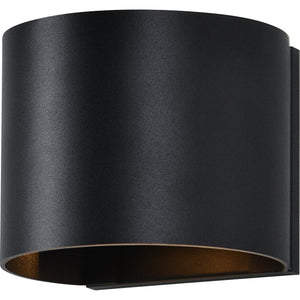 Lark Wall Sconce in matte black, featuring a gold interior and curved design.