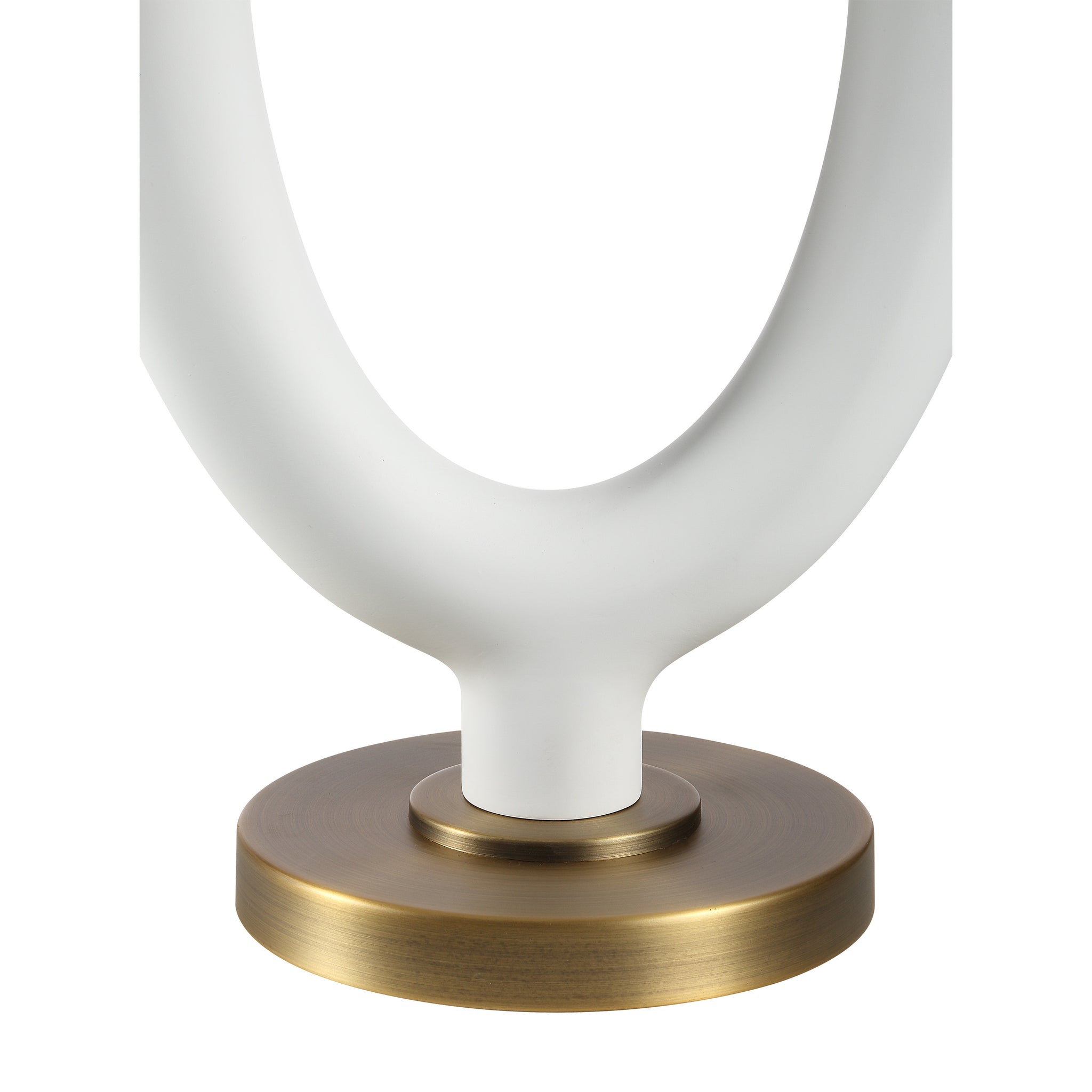 Close-up of the Aeris Table Lamp's white ceramic base with a circular cutout and a brass accent.