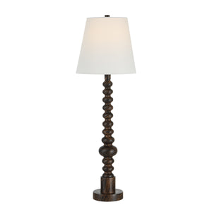 Famar Table Lamp featuring a dark wood base and illuminated white fabric shade