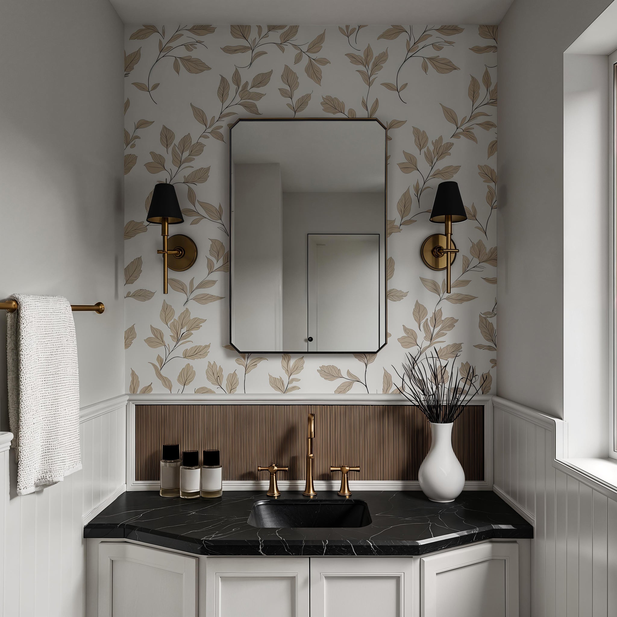 Jace mirror with a sleek black frame, reflecting a stylish bathroom with floral wallpaper and gold accents.