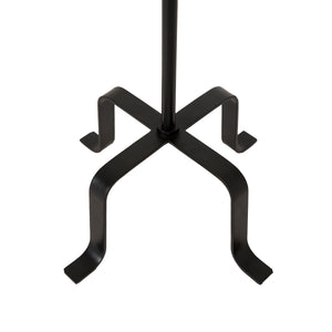 Ruslur black metal floor lamp base with a unique cross design and curved legs, viewed from above.