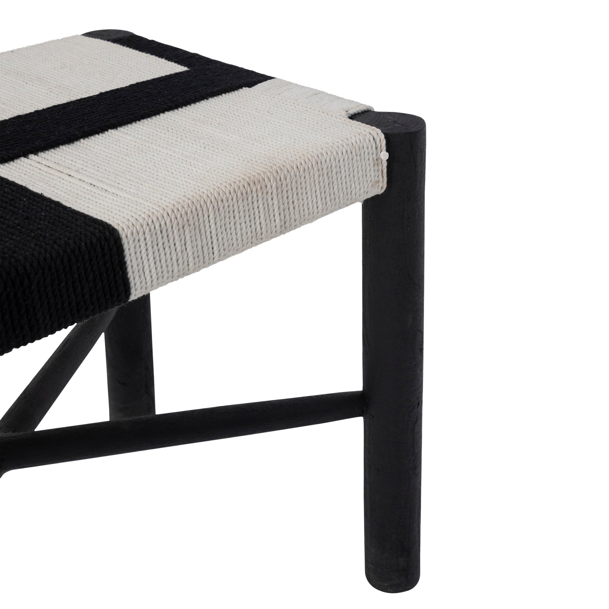 Plex stool by Renwil showing a side view of the black and white woven seat and sturdy black legs.