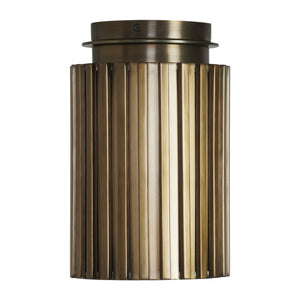 Fenice Flush Mount light with a ribbed bronze finish, showcasing vertical lines.