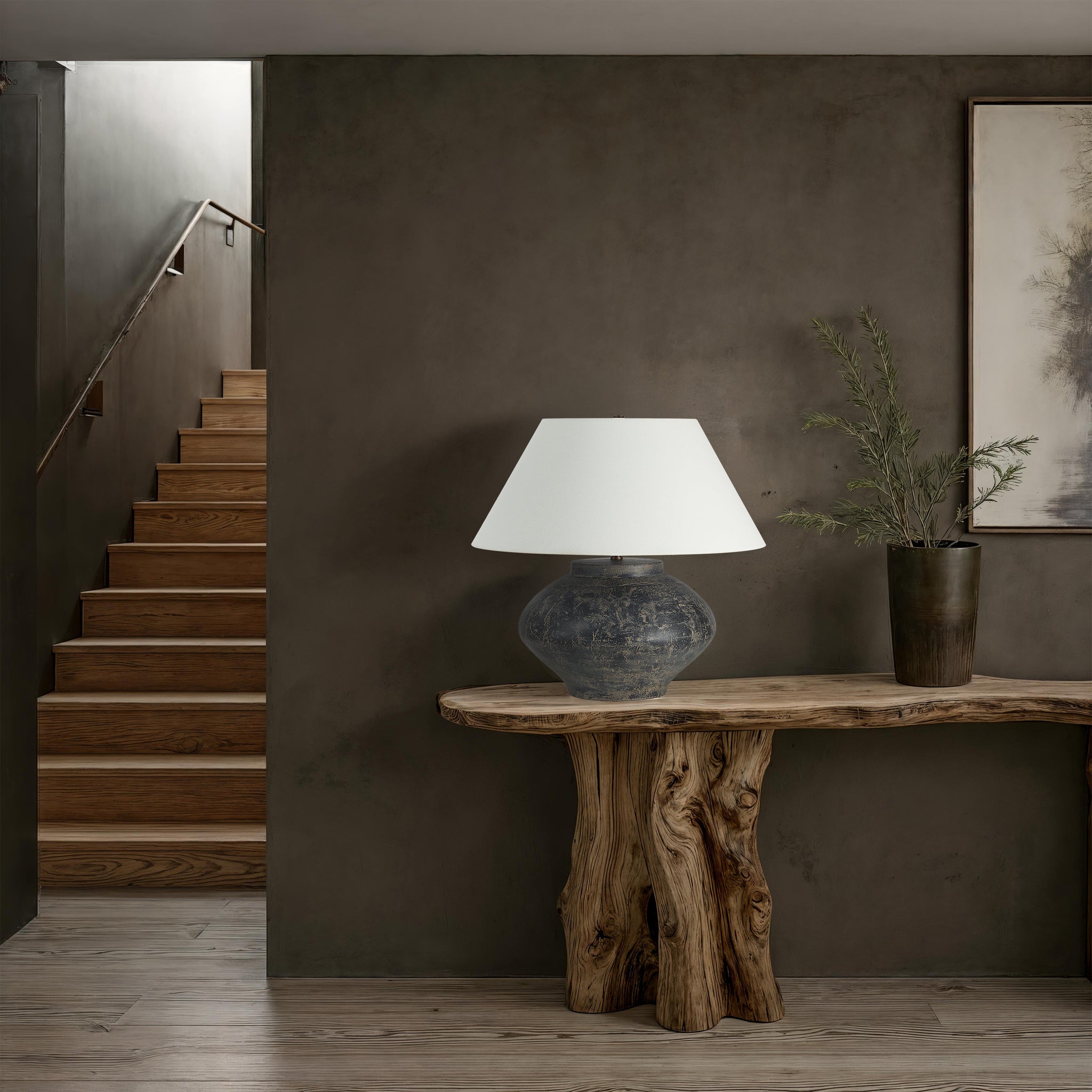 Patina table lamp on a wooden console table in a modern interior setting