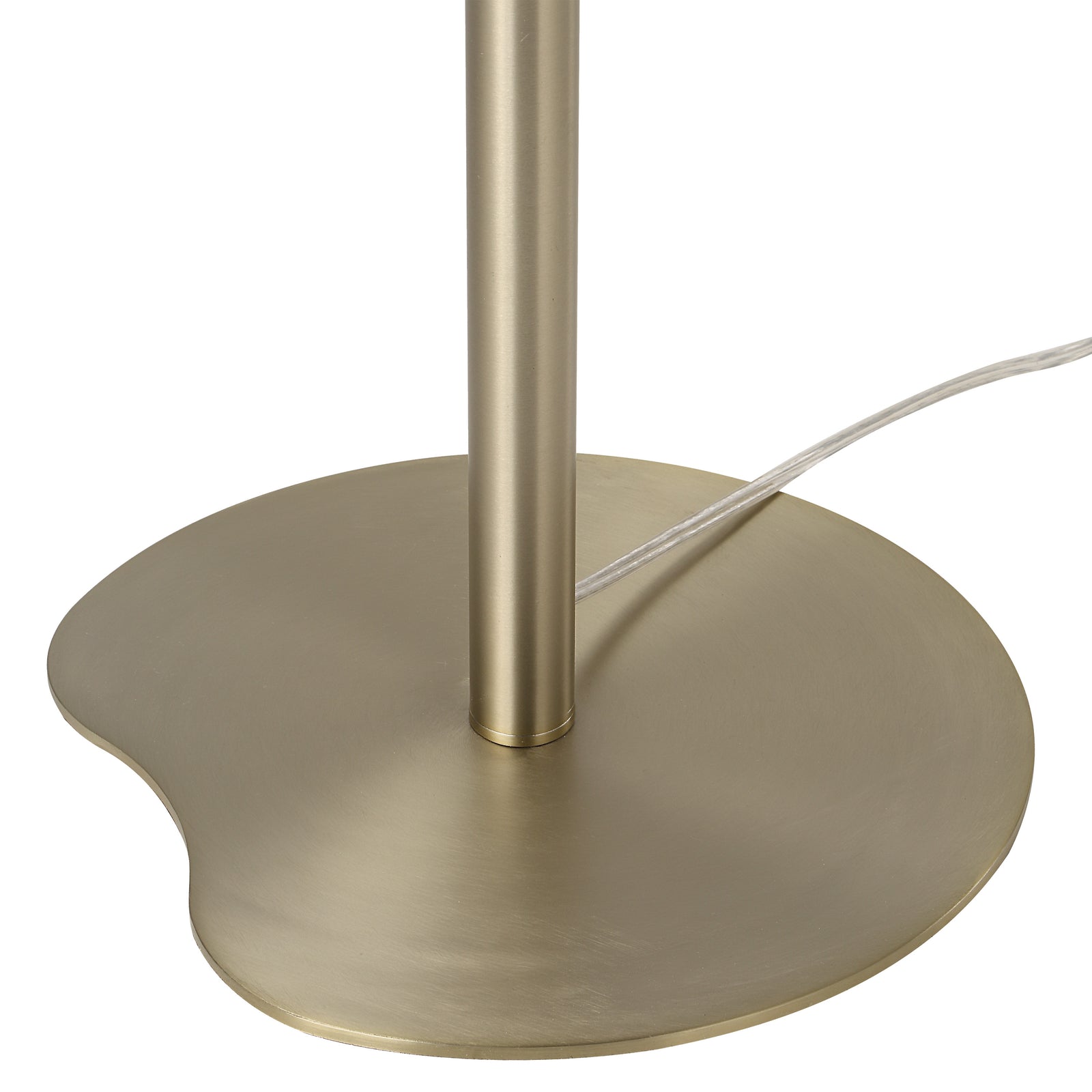 Koloa floor lamp base with a unique organic-shaped brass finish and white cord.