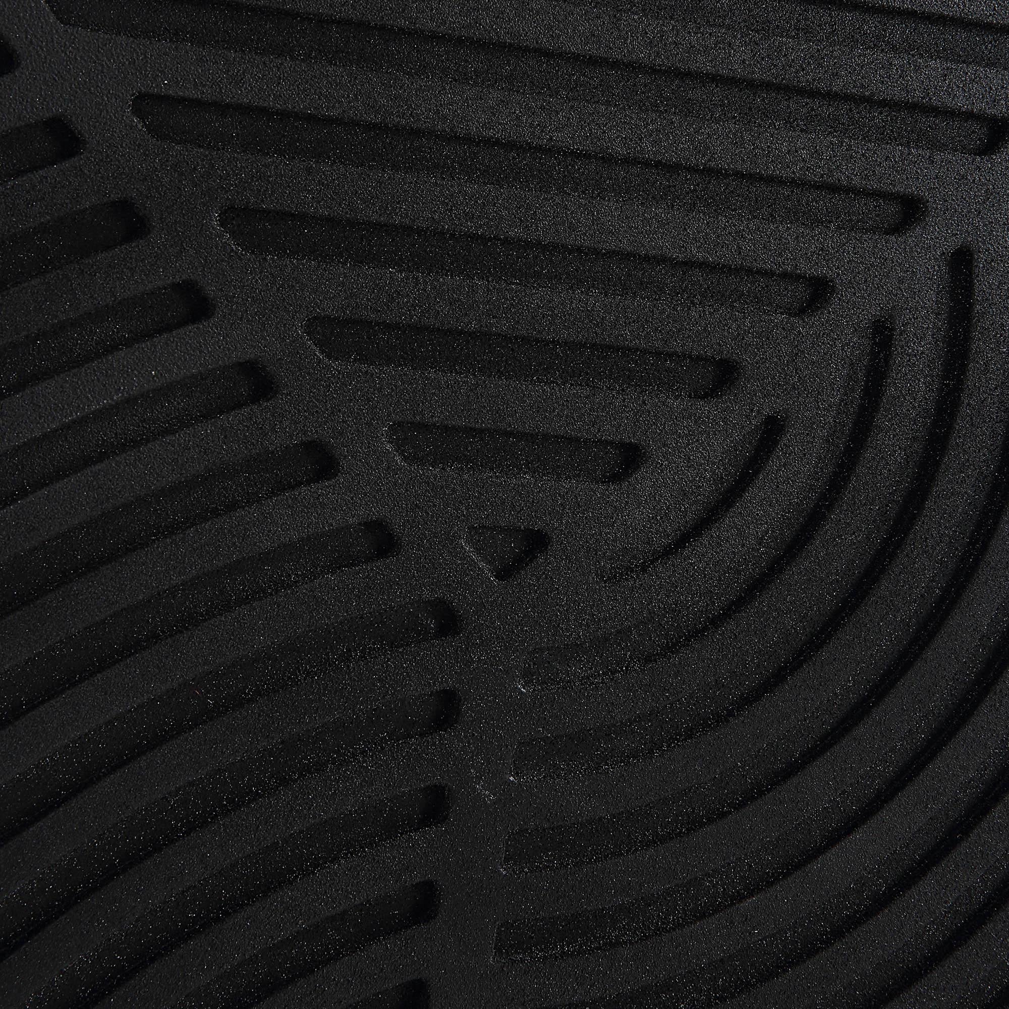 Sofia Wall Art displaying a black surface with intricate linear patterns and textures.