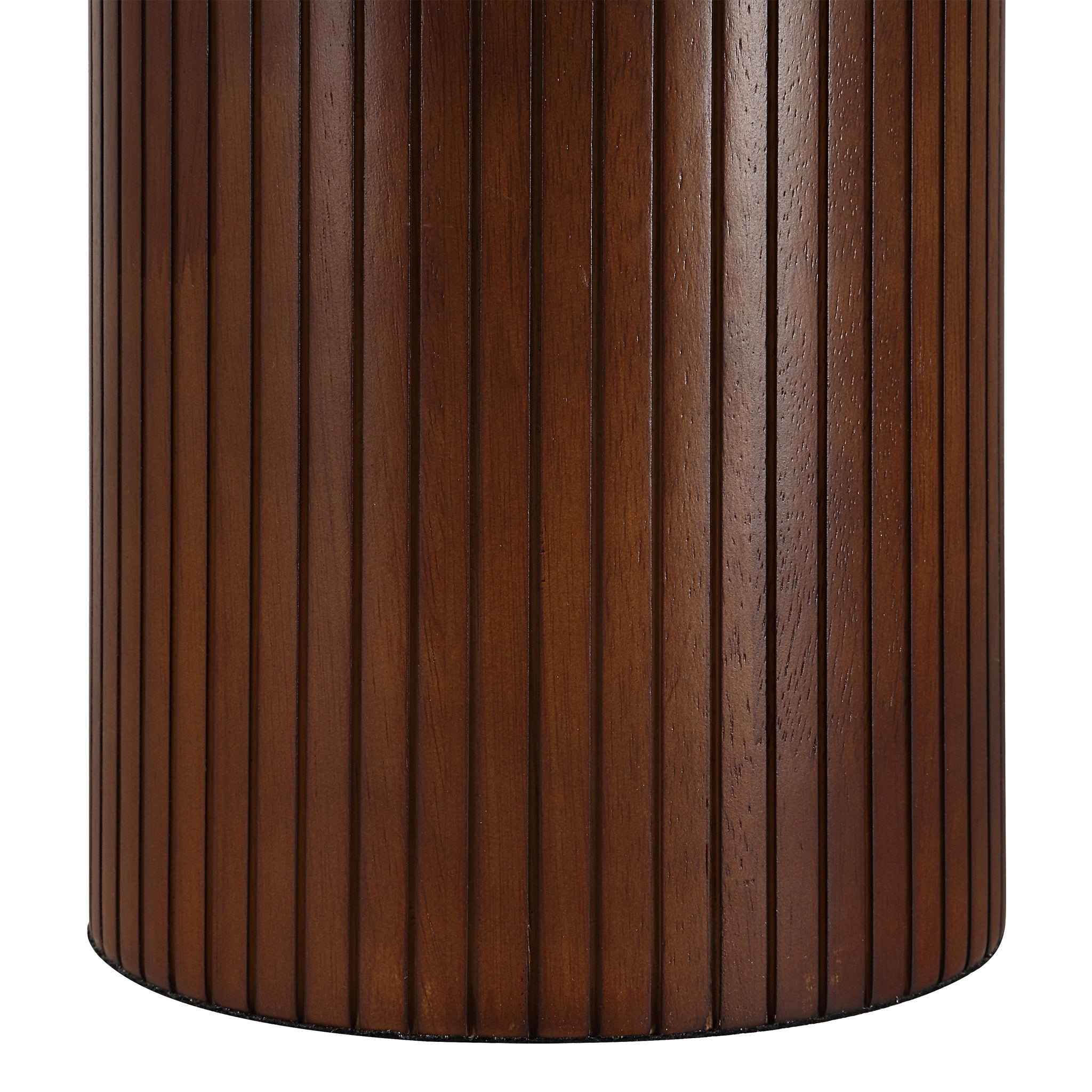 Close-up of Sanya Table Lamp's ribbed dark wood base