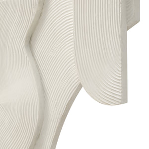 Close-up of Morpho wall art showcasing textured white surface with wavy patterns and clean edges.
