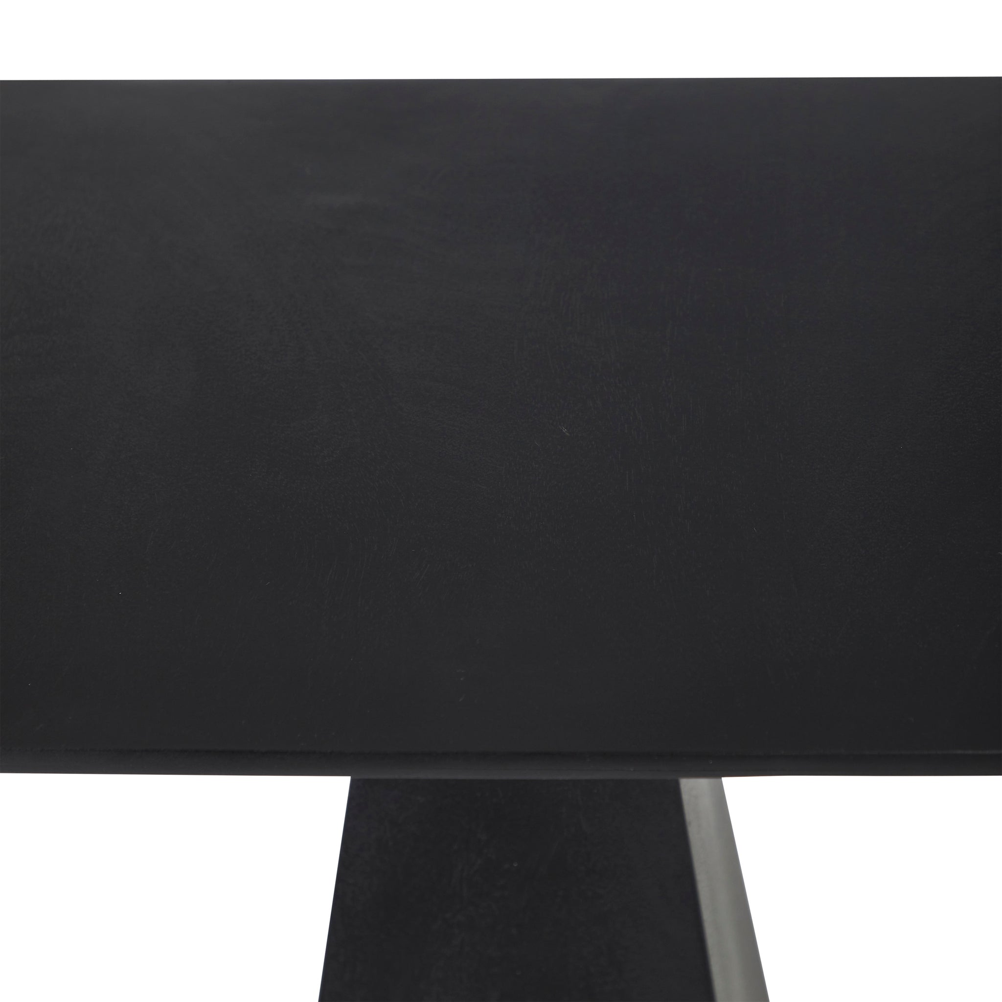 Moulin Side Table with a smooth black top surface, showcasing a minimalist design.