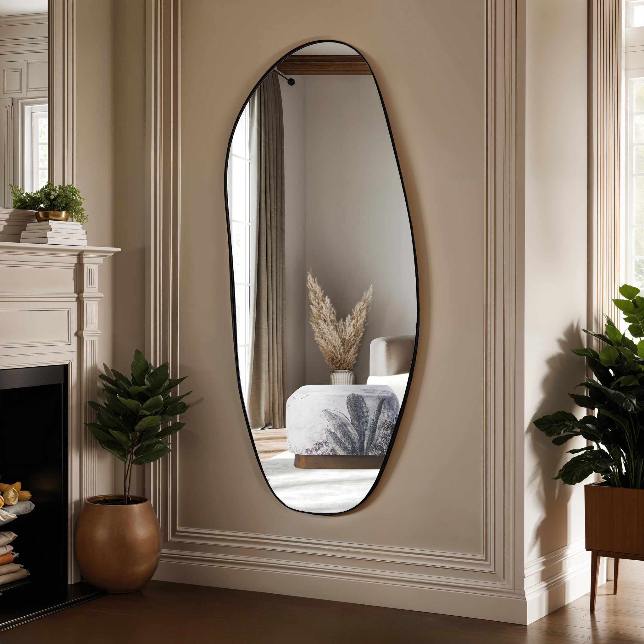 Enina mirror by Renwil displayed in a stylish room, reflecting decor with a modern black outline.