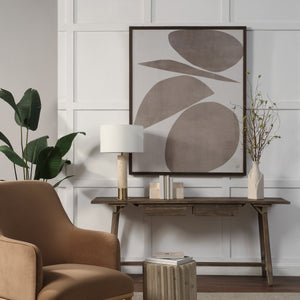 Belem wall art displayed in a modern living room setting with a brown chair and decorative elements.