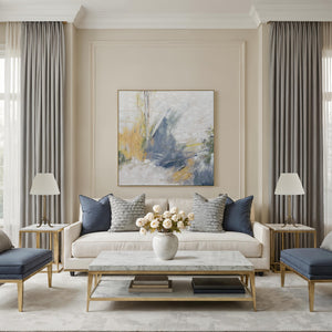 Eclat canvas art featuring abstract blue and gold design, framed, displayed in a modern living room.