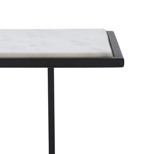 Close-up of Danica Table by Renwil showcasing the white marble surface and black edges.
