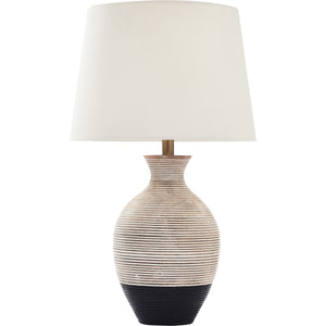 Ignacio Table Lamp with a striped ceramic base in beige and black, topped with a white fabric shade.