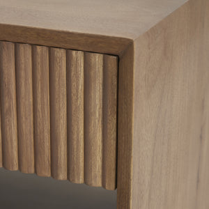 Close-up of Jaime side table showing ribbed drawer detail and smooth wood surface.