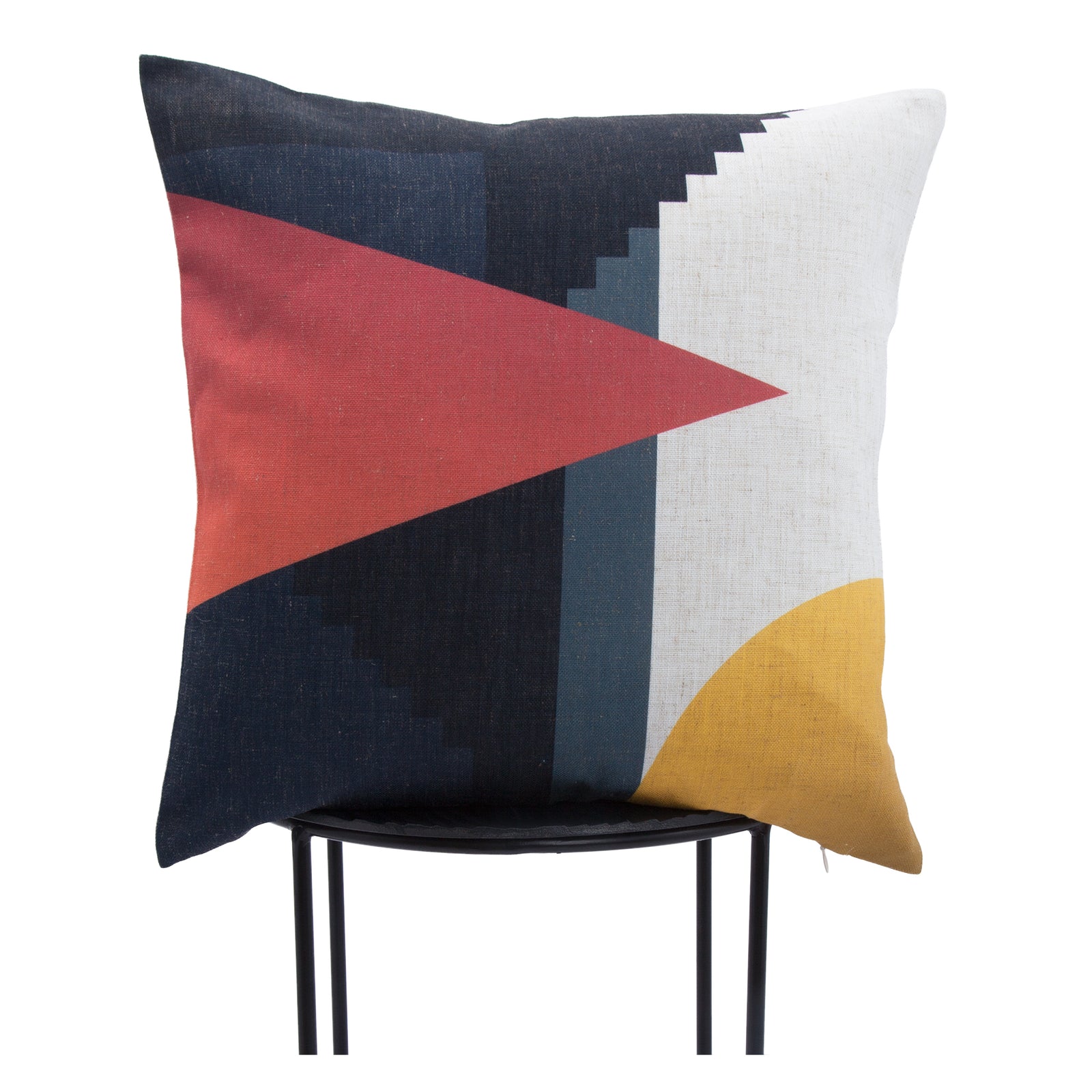 Parma Indoor Pillow featuring geometric patterns in red, navy, and yellow on a textured fabric.