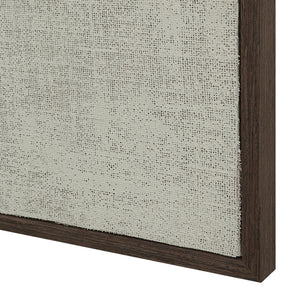 Close-up of Caramelo wall art showing the textured surface and dark wooden frame.