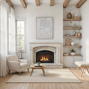 Bianchi wall art displayed above a cozy fireplace in a bright living room