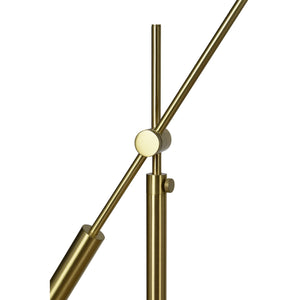 Close-up of Claire Floor Lamp, highlighting the brass finish and adjustable arm mechanism.