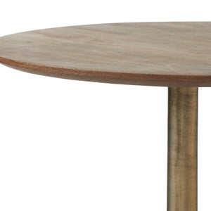 Close-up view of the Sparta Accent Table's round top and gold metal stem.