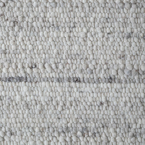 Meghan rug by Renwil, close-up of soft gray and white bobble texture, showcasing intricate details.