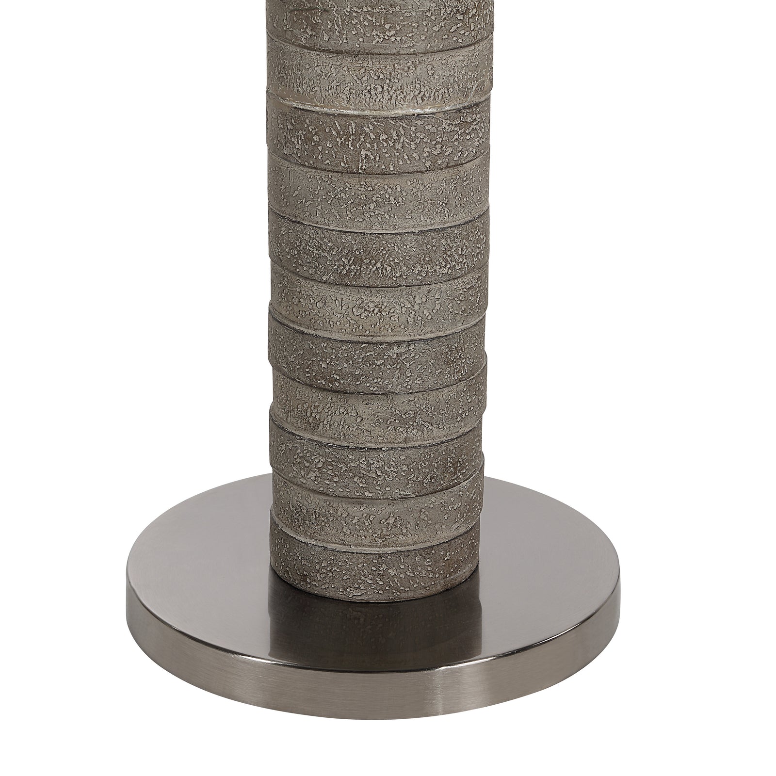 Moringa floor lamp with a textured gray base and white drum shade.