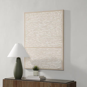 Chiari Canvas Art mounted on a wall next to a lamp and plant on a table