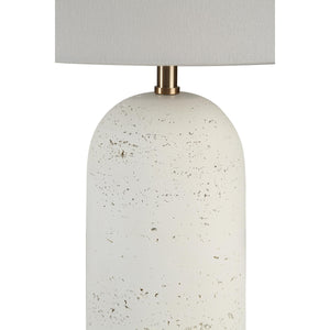 Close-up of Dorato Table Lamp featuring a white textured base and fabric shade