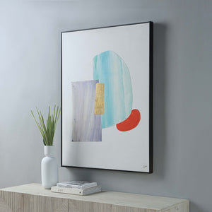 Esmerelda canvas art displayed in a modern setting with a plant and books on a table.