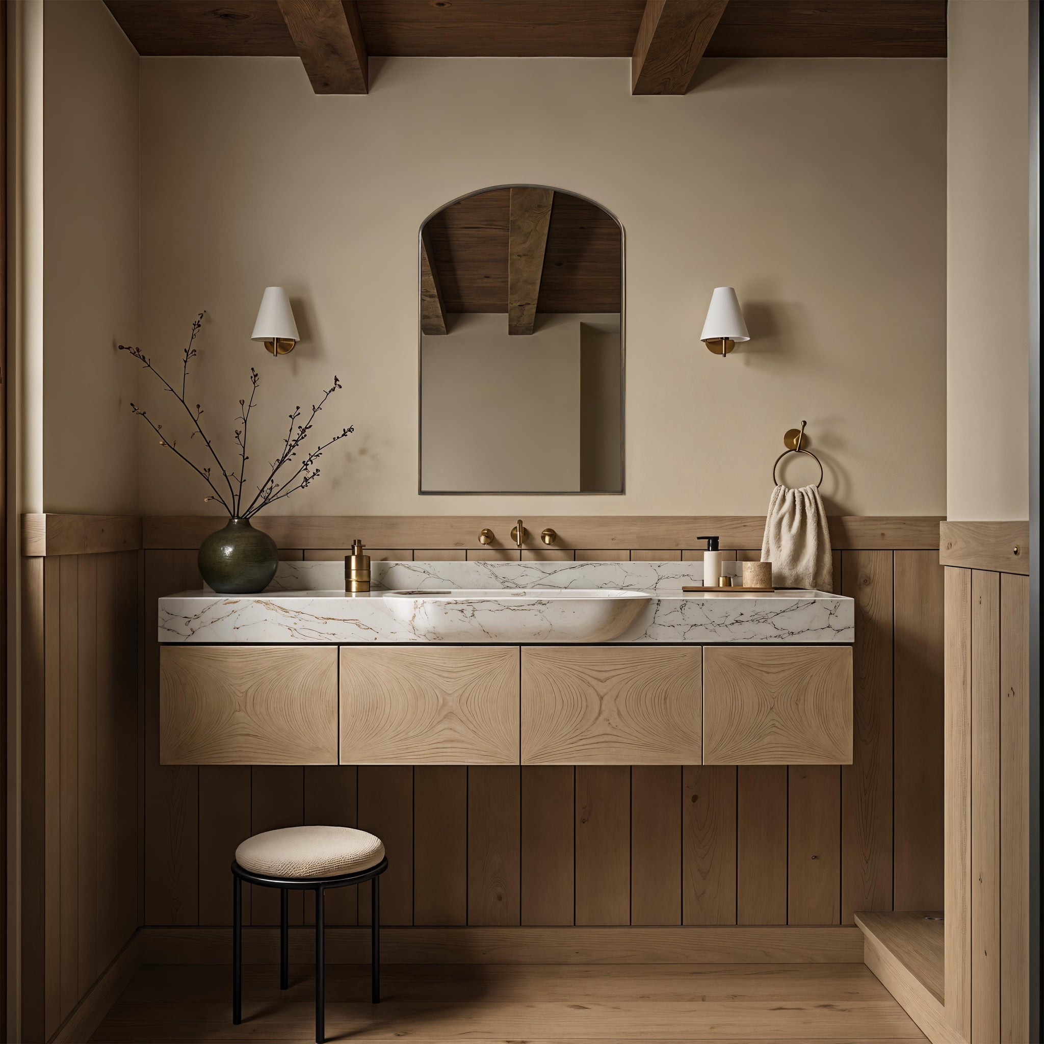 Clarisse mirror above a marble sink with wooden cabinetry in a modern bathroom setting.