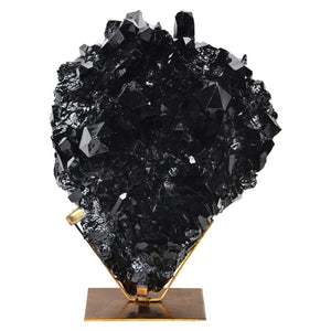Burnett Statue by Renwil, large black crystal vase with intricate facets, mounted on a gold stand.