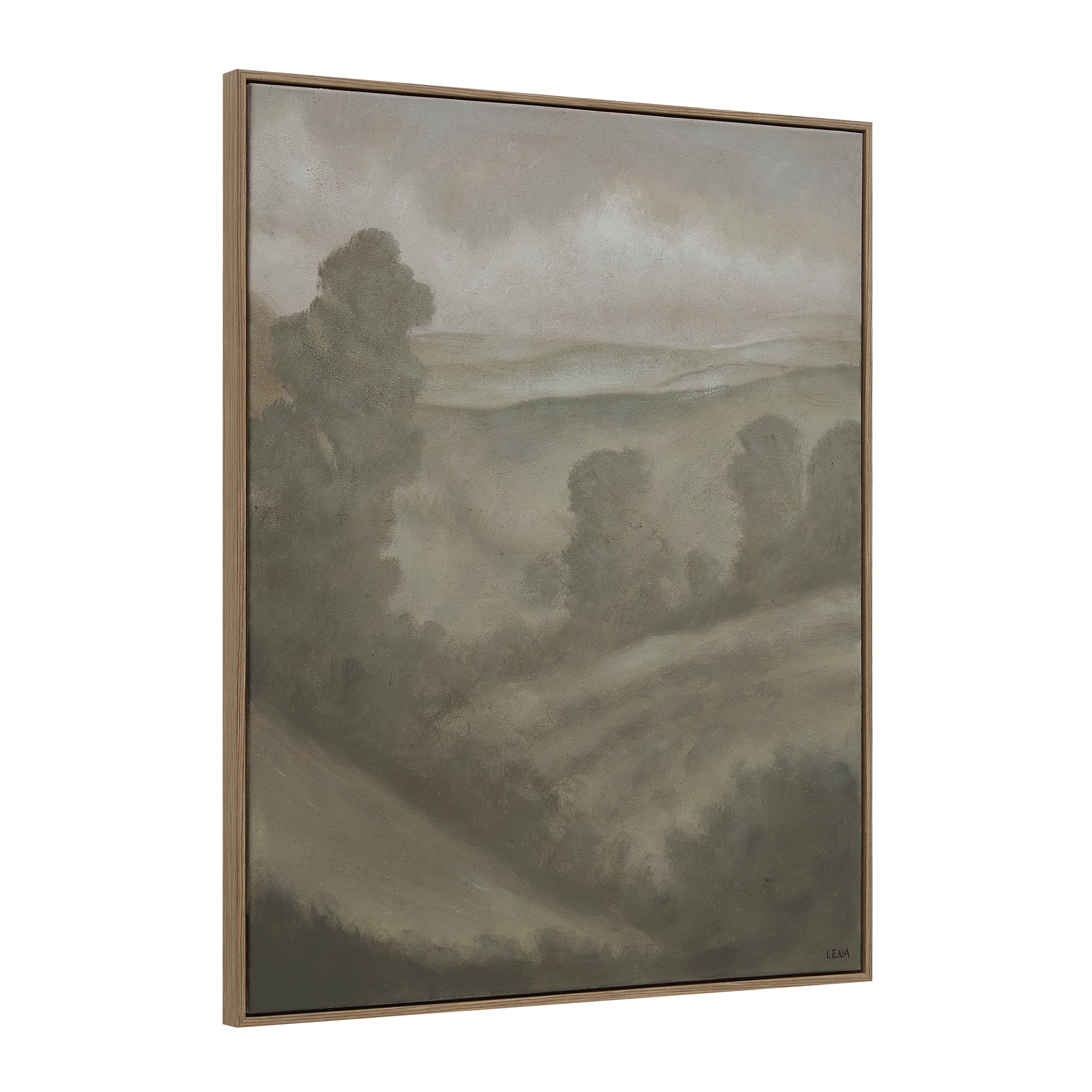 Bruma canvas art shown at an angle, depicting a serene landscape in soft gray and brown hues.