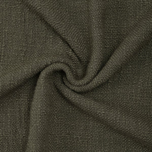 Detailed view of Chalamet Throw Blanket fabric in dark green, showing soft texture.
