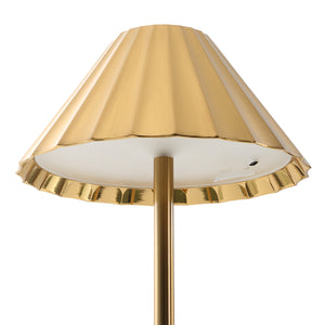 Close-up of Ginevra table lamp showing the gold pleated shade and interior.