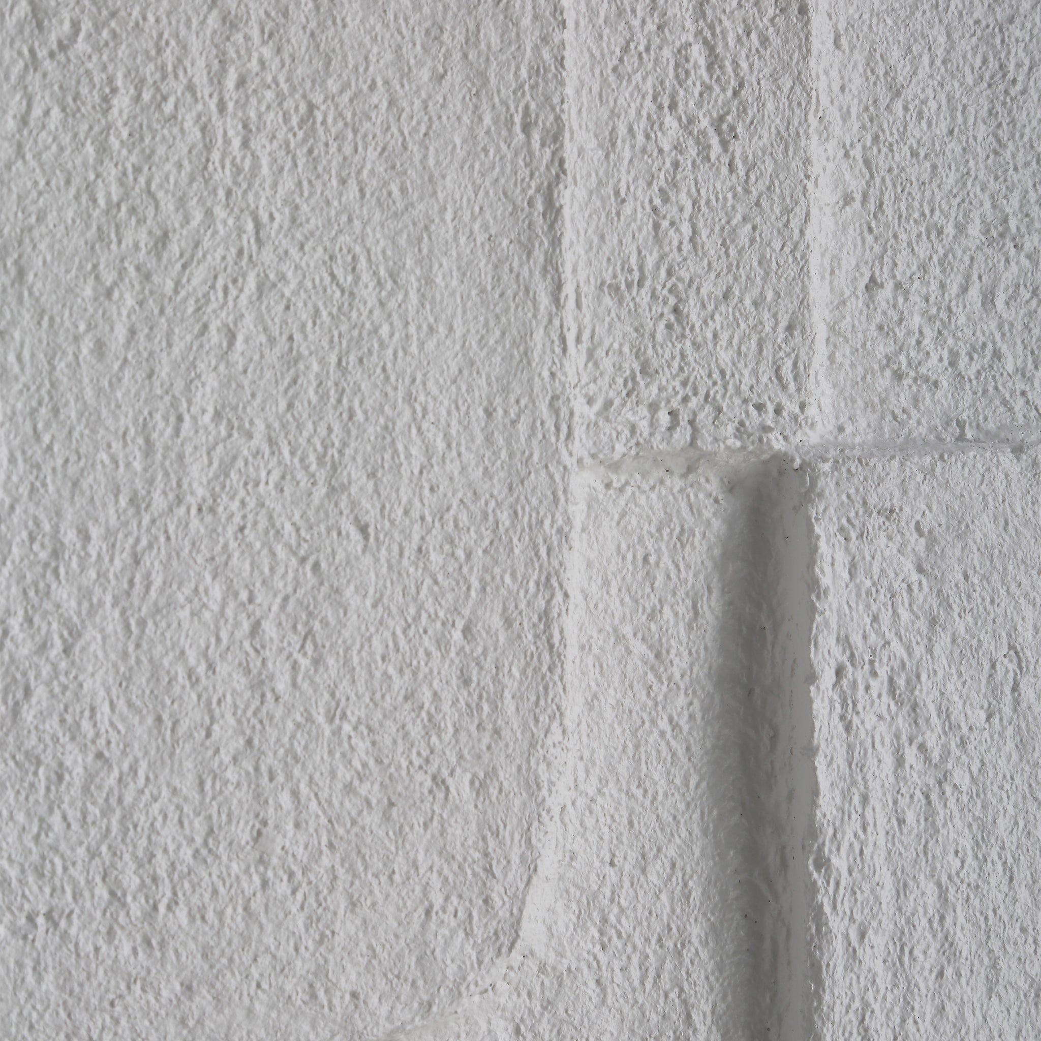 Detailed view of the textured white surface of Arches wall art by Renwil