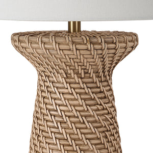 Close-up of Nathalie floor lamp's woven texture and white shade, highlighting craftsmanship.