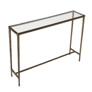 Nara console table with a clear glass top and textured silver frame from an angle.